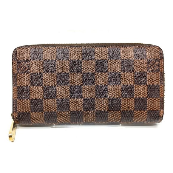 Louis Vuitton Handbags - 100% Authentic Louis Vuitton Zippy Wallet Browns Damier Ebene